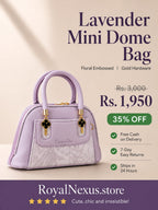 Lavender lilac mini dome bowling bag for women with floral emboss detail gold hardware and clover charm top handle luxury style 2026