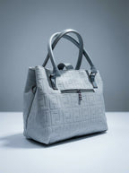 Ice blue textured structured tote bag for women with dual top handles and detachable crossbody strap luxury style 2026