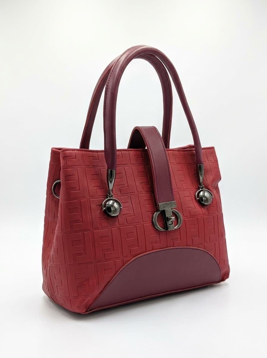 Red burgundy textured structured tote bag for women with dual top handles and detachable crossbody strap luxury style 2026