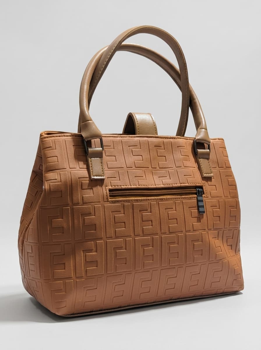 Tan brown camel textured structured tote bag for women with dual top handles and detachable crossbody strap luxury style 2026