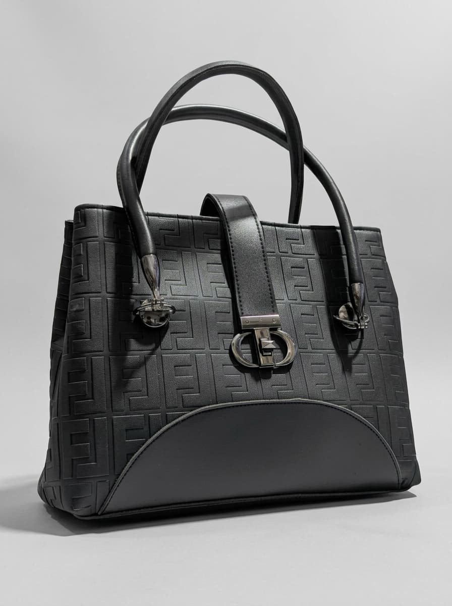 Black textured structured tote bag for women with dual top handles and detachable crossbody strap luxury style 2026