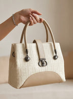 Cream textured structured tote bag for women with dual top handles and detachable crossbody strap luxury style 2026