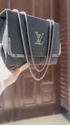 Black embossed flap chain shoulder bag for women luxury style 2 in 1 silver gunmetal chain handbag 2026 Royal Nexus